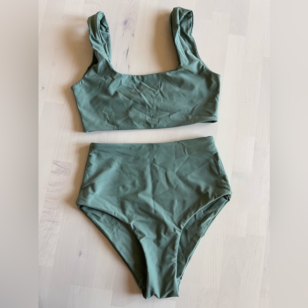 This NWOT swimsuit. Brand is SEPTEMBER. It’s a super pretty muted green color.